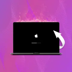 MacBook z jabłuszkiem i paskiem postępu, symbolizujący reset laptopa. Biała strzałka sugeruje proces odzyskiwania.