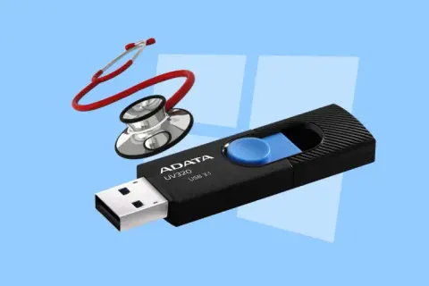 Pendrive ADATA UV320 USB 3.1 i stetoskop na jasnoniebieskim tle.