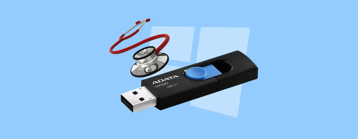 Pendrive ADATA UV320 USB 3.1 i stetoskop na jasnoniebieskim tle.