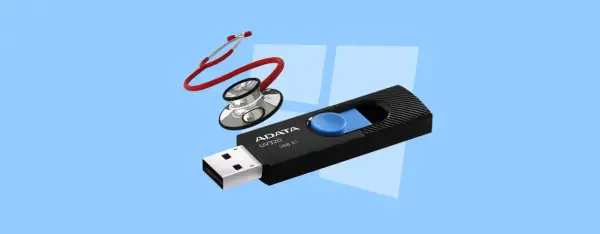 Pendrive ADATA UV320 USB 3.1 i stetoskop na jasnoniebieskim tle.