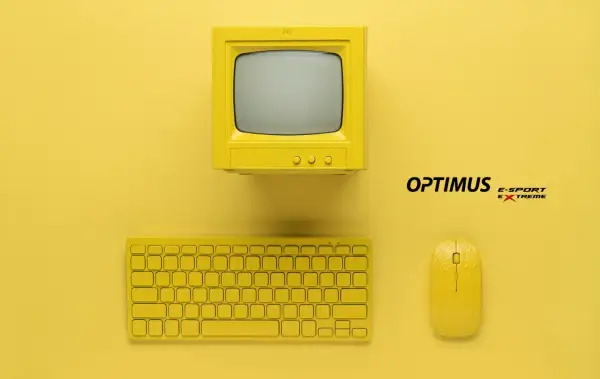 Żółty komputer retro, klawiatura i myszka. Dowiedz się, jak sprawdzić, co spowalnia komputer, by cieszyć się płynną pracą.